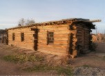 Bluff Fort -- Restored log meetinghouse, northeast corner. Lamont Crabtree Photo